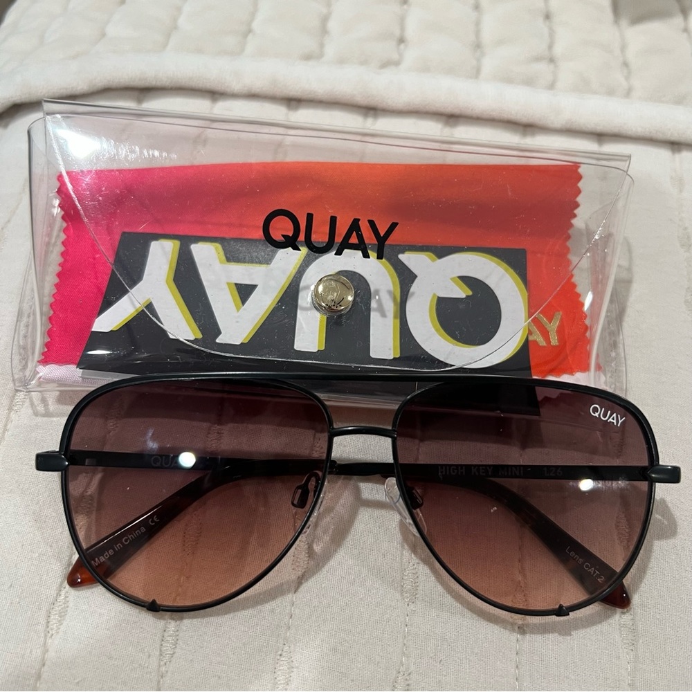 Limited edition matte black frame with brown lenses